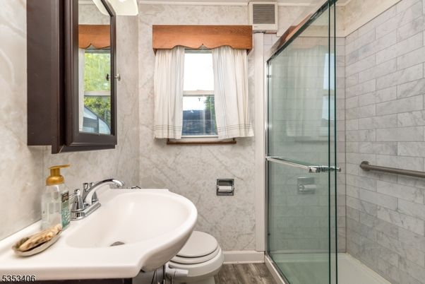 Bathroom, Glass Shower, Interior, Stone Walls, Wood Texture Flooring
