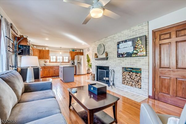 Fireplace, Interior, Kitchen, Living room, Pendant Lights, Recessed Lighting, Stone Walls, Wood Texture Flooring
