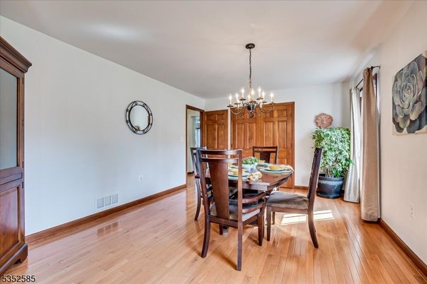 Chandelier, Dining room, Interior, Wood Texture Flooring