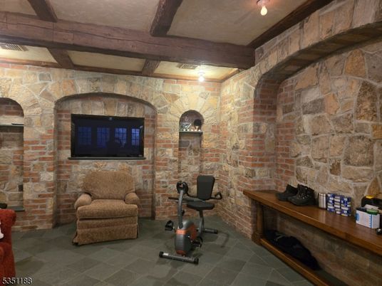 Fitness Equipment, Interior, Stone Walls, Wooden Beams