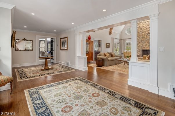 Fireplace, Interior, Living room, Recessed Lighting, Stone Walls, Wood Texture Flooring