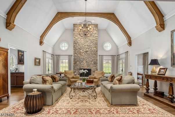 Chandelier, Fireplace, Interior, Living room, Stone Walls, Wooden Beams, Wood Texture Flooring