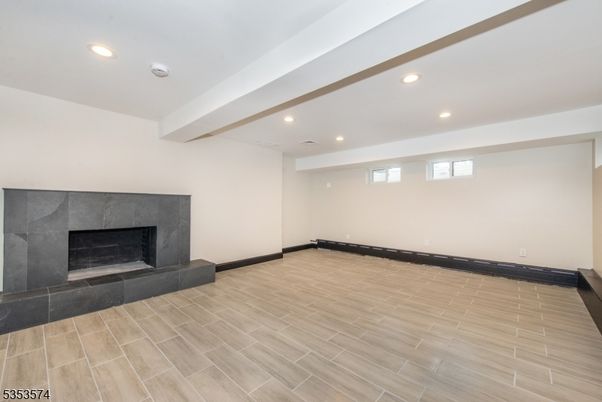 Empty room, Fireplace, Interior, Recessed Lighting, Wood Texture Flooring