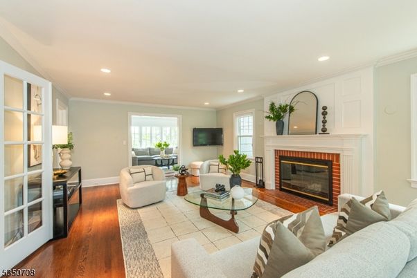Fireplace, Interior, Living room, Recessed Lighting, Wood Texture Flooring