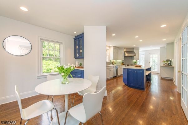 Dining room, Interior, Kitchen, Recessed Lighting, Stainless Steel Appliances, Wood Texture Flooring