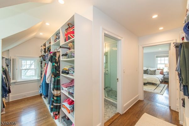 Bathroom, Bedroom, Glass Shower, Interior, Recessed Lighting, Walk-in Closets, Wood Texture Flooring