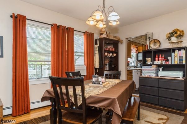 Chandelier, Dining room, Interior, Wood Texture Flooring