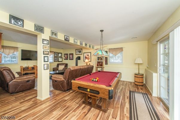 Billiard Table, Game Room, Interior, Living room, Pendant Lights, Wood Texture Flooring