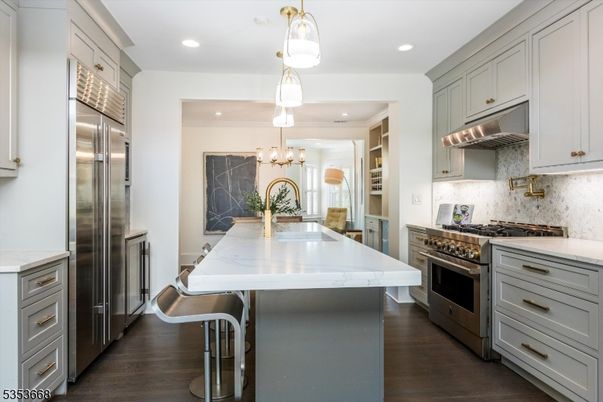 Chandelier, Interior, Kitchen, Pendant Lights, Recessed Lighting, Stainless Steel Appliances, Wood Texture Flooring