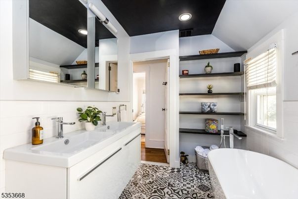 Bathroom, Dual Sink Vanities, Free Standing Baths, Interior, Recessed Lighting, Wood Texture Flooring