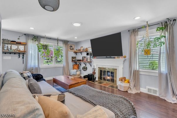 Fireplace, Interior, Living room, Recessed Lighting, Wood Texture Flooring