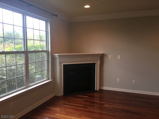Empty room, Fireplace, Interior, Recessed Lighting, Wood Texture Flooring