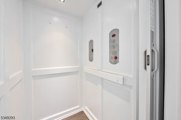 Elevator, Interior, Recessed Lighting, Wood Texture Flooring