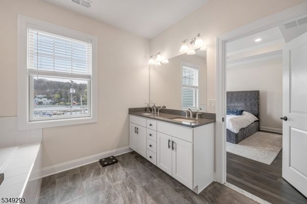 Bathroom, Bedroom, Dual Sink Vanities, Interior, Recessed Lighting, Wood Texture Flooring