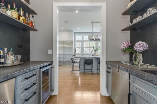 Chandelier, Interior, Kitchen, Pendant Lights, Recessed Lighting, Stainless Steel Appliances, Wood Texture Flooring