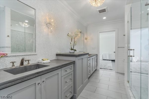 Bathroom, Chandelier, Dual Sink Vanities, Glass Shower, Interior, Recessed Lighting