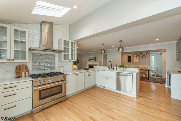 Dining room, Interior, Kitchen, Pendant Lights, Recessed Lighting, Stainless Steel Appliances, Wood Texture Flooring
