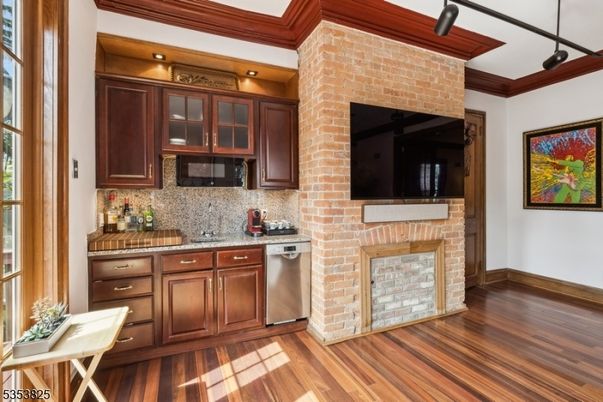 Fireplace, Interior, Kitchen, Stainless Steel Appliances, Stone Walls, Wood Texture Flooring