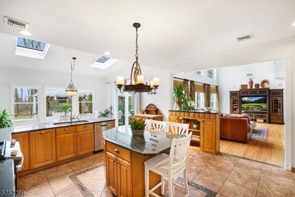 Chandelier, Interior, Kitchen, Living room, Pendant Lights, Recessed Lighting, Wood Texture Flooring