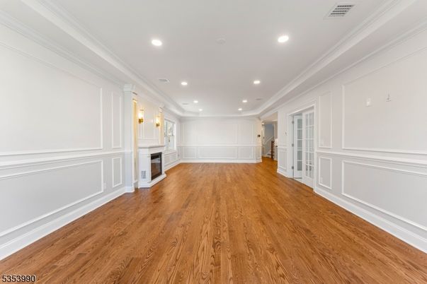 Empty room, Fireplace, Interior, Pendant Lights, Recessed Lighting, Wood Texture Flooring