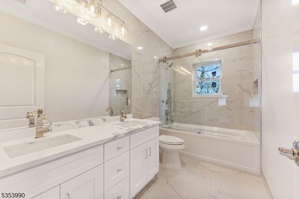 Bathroom, Dual Sink Vanities, Glass Shower, Interior, Marble, Marble Walls, Recessed Lighting