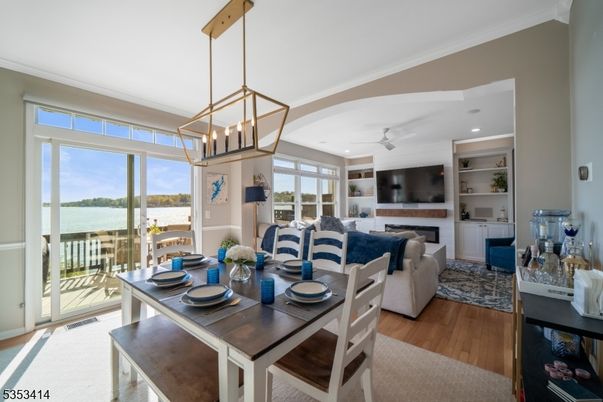 Dining room, Interior, Living room, Pendant Lights, Recessed Lighting, Water, Wood Texture Flooring