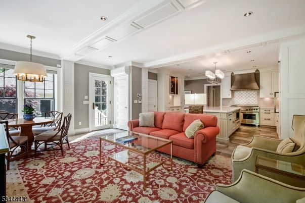 Chandelier, Dining room, Interior, Kitchen, Living room, Recessed Lighting, Stainless Steel Appliances, Wood Texture Flooring