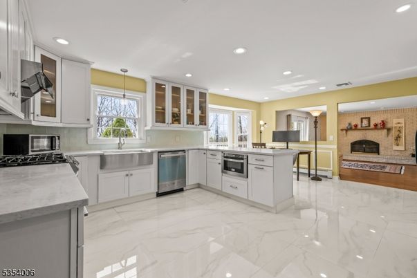 Fireplace, Interior, Kitchen, Marble, Pendant Lights, Recessed Lighting, Stainless Steel Appliances