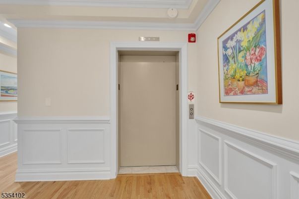 Elevator, Interior, Recessed Lighting, Wood Texture Flooring