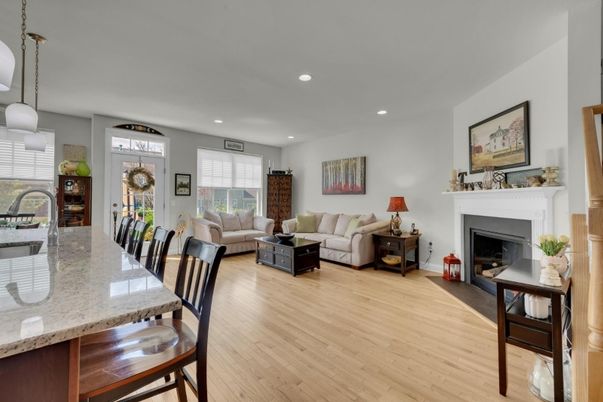 Dining room, Fireplace, Interior, Living room, Pendant Lights, Recessed Lighting, Wood Texture Flooring