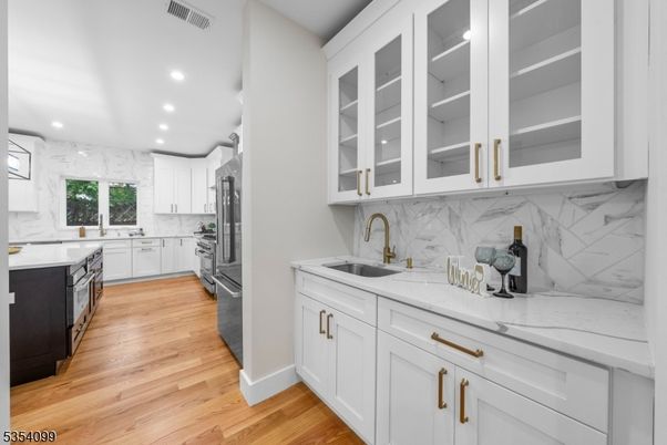 Interior, Kitchen, Marble Walls, Recessed Lighting, Wood Texture Flooring