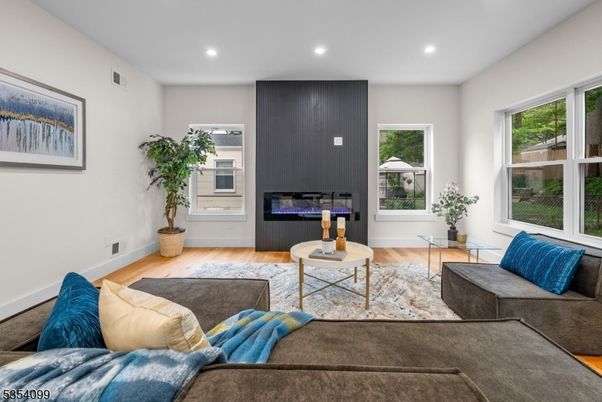 Fireplace, Interior, Living room, Recessed Lighting, Wood Texture Flooring