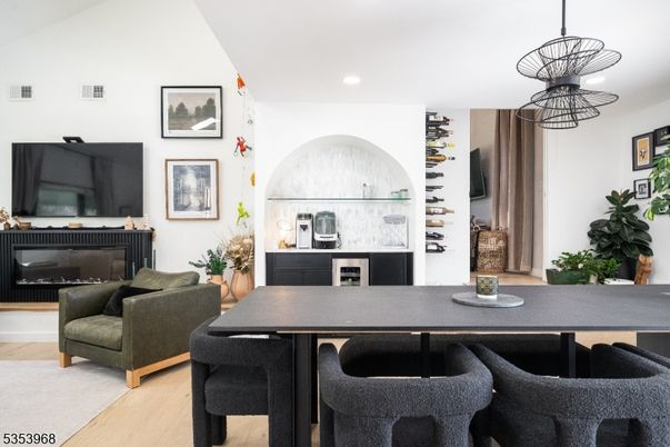 Dining room, Fireplace, Interior, Living room, Pendant Lights, Recessed Lighting, Wood Texture Flooring