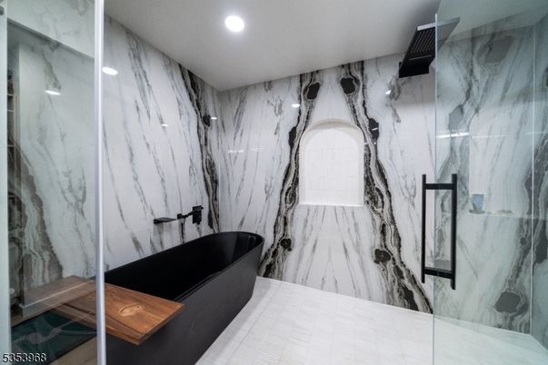 Bathroom, Free Standing Baths, Glass Shower, Interior, Marble Walls, Recessed Lighting