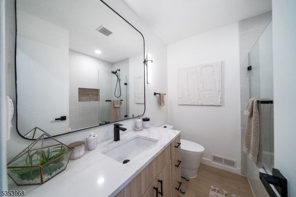 Bathroom, Dual Sink Vanities, Interior, Recessed Lighting, Wood Texture Flooring