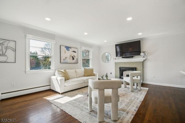 Fireplace, Interior, Living room, Recessed Lighting, Wood Texture Flooring