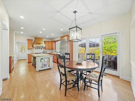 Dining room, Interior, Kitchen, Pendant Lights, Recessed Lighting, Stainless Steel Appliances, Wood Texture Flooring