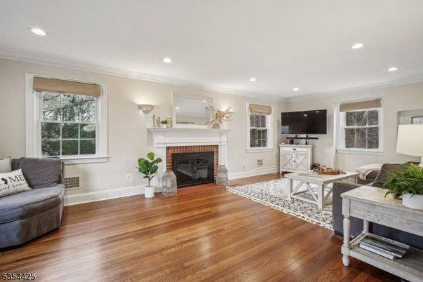 Fireplace, Interior, Living room, Recessed Lighting, Wood Texture Flooring
