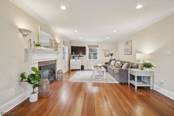 Fireplace, Interior, Living room, Recessed Lighting, Wood Texture Flooring