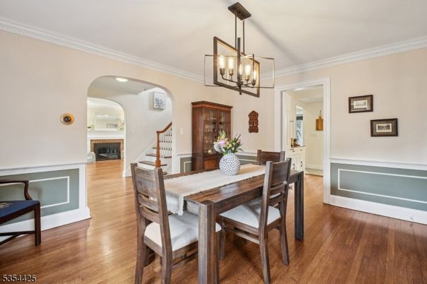 Dining room, Fireplace, Interior, Pendant Lights, Recessed Lighting, Wood Texture Flooring