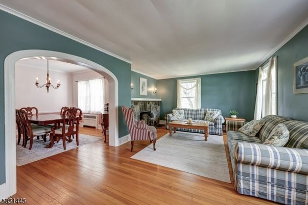 Chandelier, Dining room, Fireplace, Interior, Living room, Wood Texture Flooring