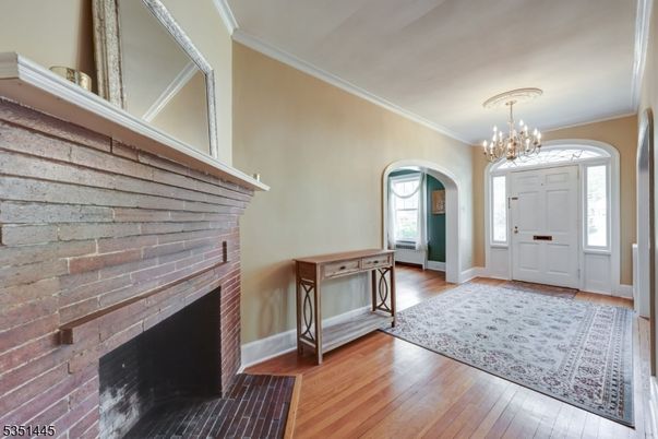 Chandelier, Fireplace, Interior, Stone Walls, Wood Texture Flooring