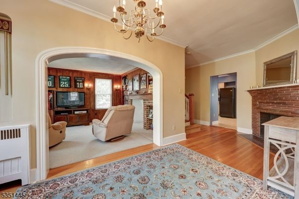 Chandelier, Fireplace, Interior, Wood Texture Flooring