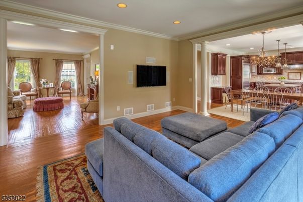 Chandelier, Dining room, Interior, Kitchen, Living room, Recessed Lighting, Wood Texture Flooring