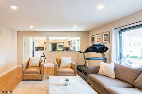 Fitness Equipment, Interior, Kitchen, Living room, Recessed Lighting, Wood Texture Flooring