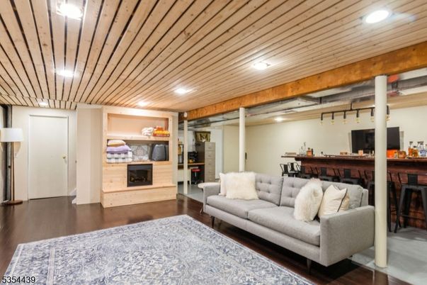Fireplace, Interior, Living room, Recessed Lighting, Wooden Ceilings, Wood Texture Flooring