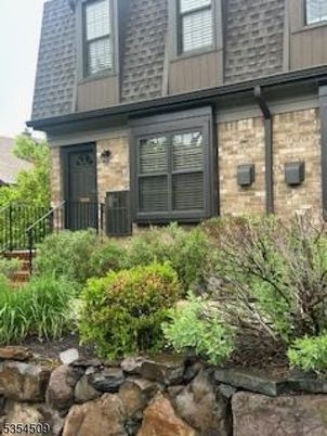 Exterior, Facade, Brick Facade, Cape Cod