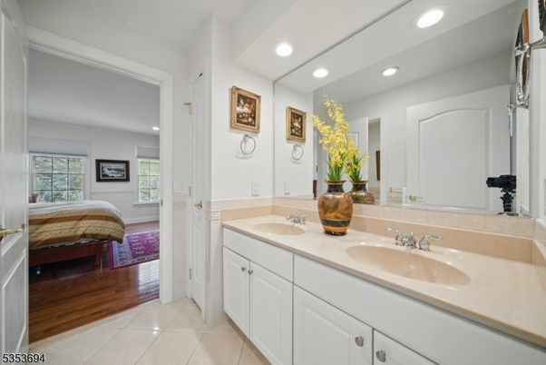 Bathroom, Dual Sink Vanities, Interior, Recessed Lighting, Wood Texture Flooring