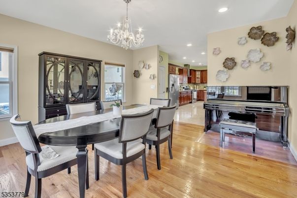 Chandelier, Dining room, Interior, Kitchen, Piano, Recessed Lighting, Wood Texture Flooring