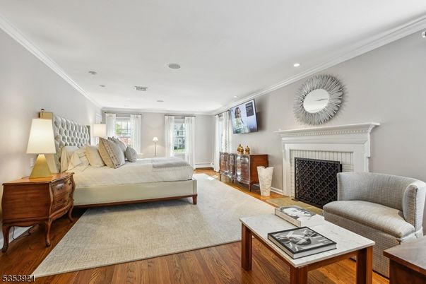 Bedroom, Fireplace, Interior, Recessed Lighting, Wood Texture Flooring